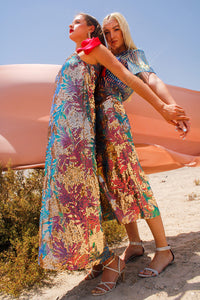 Prismatic Sequins Dress,Festive Luxury,Doppelganger Design,Glamorous Attire,Slip Dress,Long Sleeve Top,Eid Celebration,Birthday Dinner,Versatile Styling,Festive Looks,Touch of Elegance,UAE Shipping, Red ribbon ties,Affordable Shipping,AED 15 Shipping,Special Occasion Dress,Sparkling Glamour,Luxury WEAR,Festive Fashion