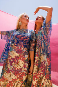 Prismatic Sequins Skirt,Fashion-Forward,Regional Designers,Midi Skirt,Duo-Chrome Sequins,Modern Style,Modest Fashion,Matching Looks,Friend Coordination,,Festive Wear,UAE Label,International Shipping,Stylish Ensemble,Sparkling Design,modest Skirt,Fashionable Choice,Doppelganger Skirt,Sequin Glamour,Luxury wear,Party wear