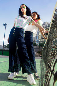 Uprooted Jeans,Doppelganger Denim,,Sustainable DenimUpcycled Denim,,Dead Stock Denim,Reduce Landfill Waste,Wide Leg Jeans,Large Silver Buttons,Tulip-Shaped Pockets,Neon Green Topstitching,Phone Pocket Design,Shop Local UAE,Shop Small,Sale on Uprooted Jeans,Eco-Friendly Denim,Ethical Fashion,Sustainable Clothing,UAE Fashion,Upcycled Fashion,Sustainable Fashion Sale
