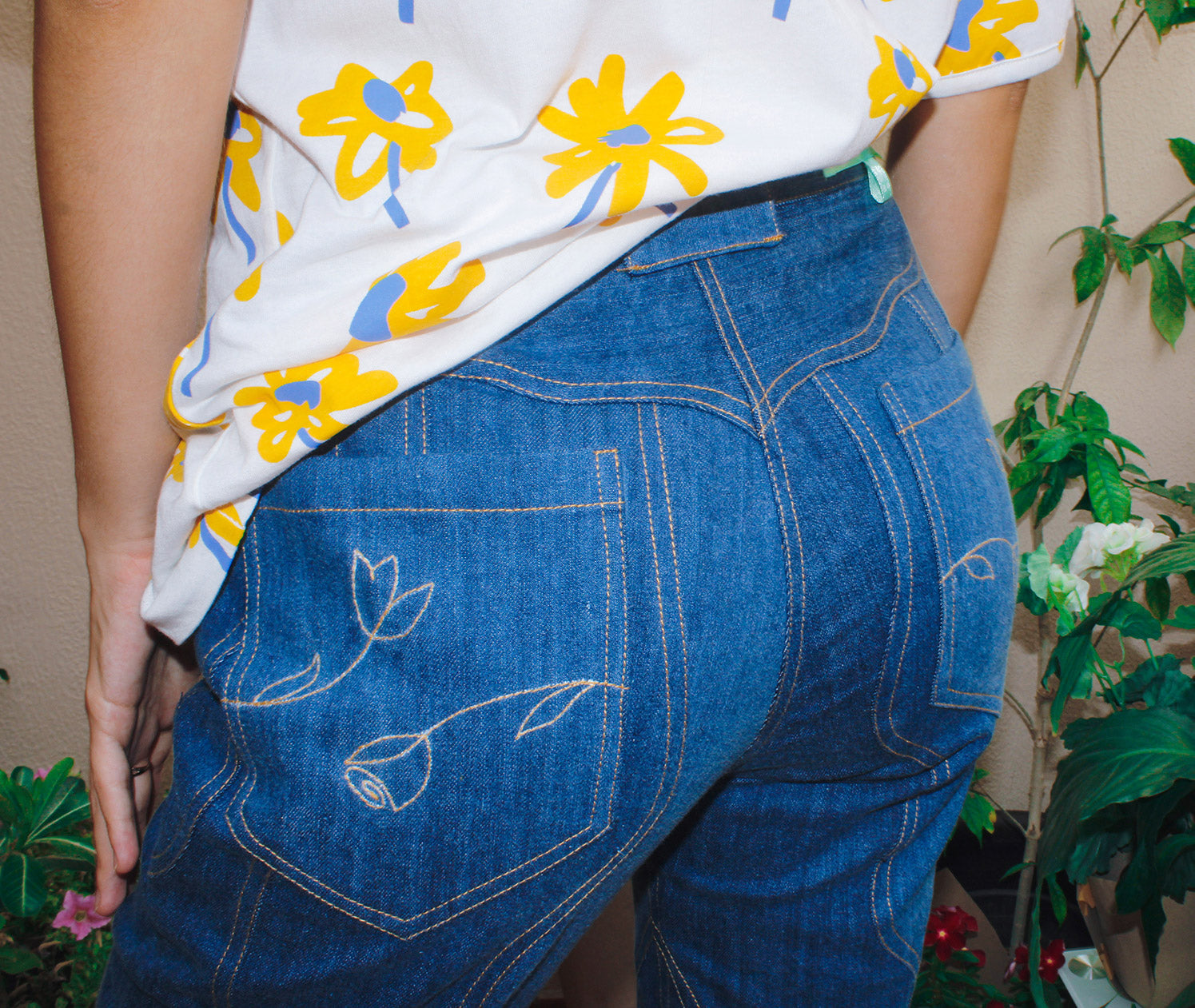 Waverly Jeans,Wave Seams,Floral Stitch Detail,High-Waisted Design,Boot-Leg Hemline,Upcycled Deadstock,Sustainable Fashion,Reducing Landfill Waste,Doppelganger Denim,Wardrobe StapleVersatile Styling,,Twinning Looks,Unique Seam Detailing,Eco-Friendly Jeans,Sustainable Style,Fashionable Denim,Button Closure,Back Pocket Embellishments,dubai fashion,functional,Pair of jeans