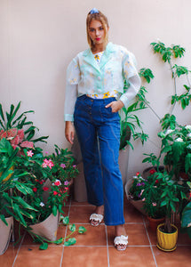 Botanical Jacket,Garden Party Attire,Botanical Garden Collection,Lightweight Organza,Inverted Box Pleat,Tie String Closure,Whimsical Yoke,Summer Fashion,Beach Party Outfit,Functional Pockets,Elegance and Utility,UAE-Based Design,GCC Shipping,Playful Aesthetic,Floral Inspired,Carefree Summer Style,Enchanting Silhouette,Versatile Elegance,Nature-Inspired,Chic and Breezy