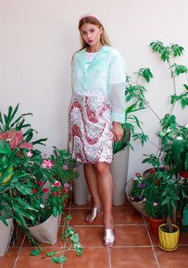 Botanical Jacket,Garden Party Attire,Botanical Garden Collection,Lightweight Organza,Inverted Box Pleat,Tie String Closure,Whimsical Yoke,Summer Fashion,Beach Party Outfit,Functional Pockets,Elegance and Utility,UAE-Based Design,GCC Shipping,Playful Aesthetic,Floral Inspired,Carefree Summer Style,Enchanting Silhouette,Versatile Elegance,Nature-Inspired,Chic and Breezy