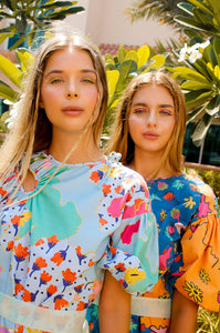 Botany Dress,Garden Collection,Summer Vibes,Matching Dresses,Twinning Outfits,Coordinating Attire,Friendship Twinning,Botanical Theme,Matching Set,Ensemble,Friend-Matching, Mid-Length Dresses,Whimsical Style,Botanical Prints,Twinning Picnic,Comfortable Attire,Outdoor Chic,Floral Group Outfit,Picnic Fashion,UAE-Based