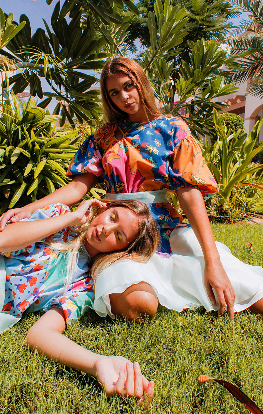 Botany Dress,Garden Collection,Summer Vibes,Matching Dresses,Twinning Outfits,Coordinating Attire,Friendship Twinning,Botanical Theme,Matching Set,Ensemble,Friend-Matching, Mid-Length Dresses,Whimsical Style,Botanical Prints,Twinning Picnic,Comfortable Attire,Outdoor Chic,Floral Group Outfit,Picnic Fashion,UAE-Based