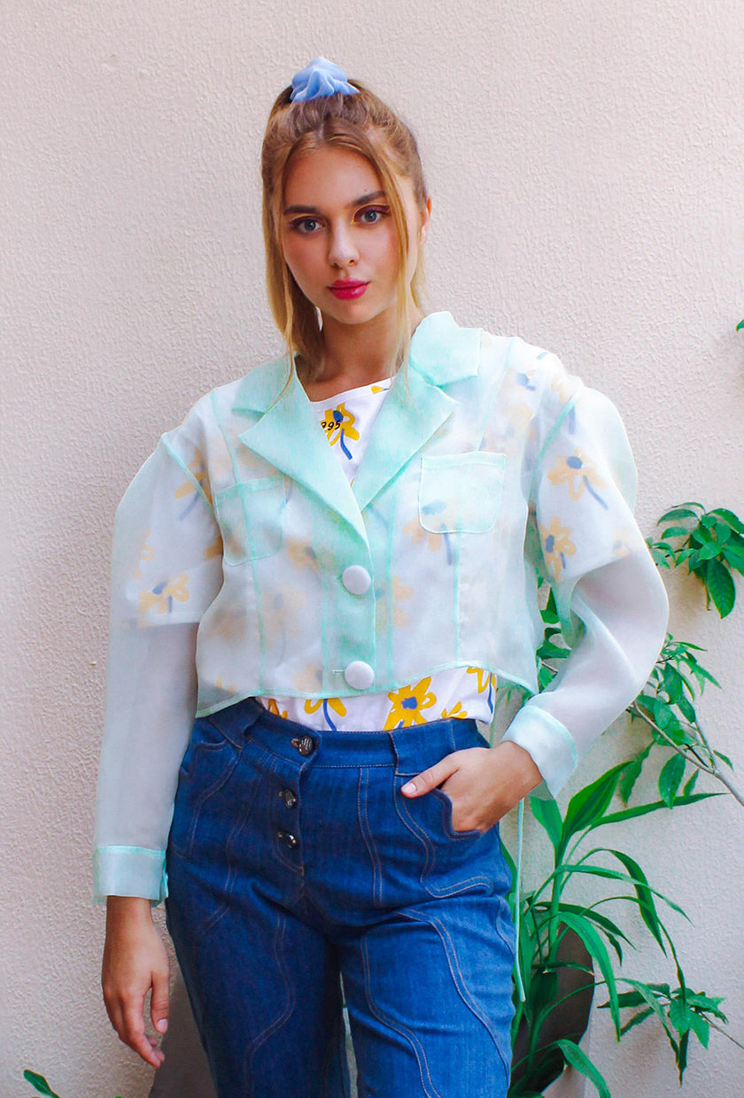 Botanical Jacket,Garden Party Attire,Botanical Garden Collection,Lightweight Organza,Inverted Box Pleat,Tie String Closure,Whimsical Yoke,Summer Fashion,Beach Party Outfit,Functional Pockets,Elegance and Utility,UAE-Based Design,GCC Shipping,Playful Aesthetic,Floral Inspired,Carefree Summer Style,Enchanting Silhouette,Versatile Elegance,Nature-Inspired,Chic and Breezy